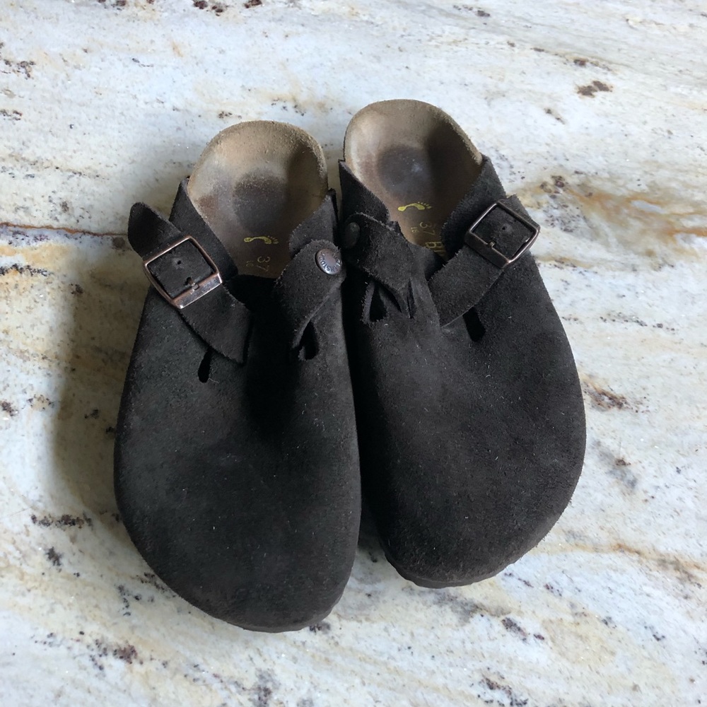 Birkenstock’s: brown leather slip ons